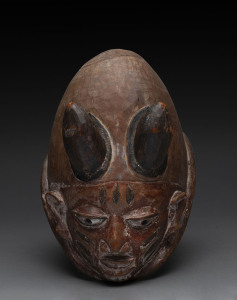 Gelede mask with two horns, carved wood with polychrome finish and remains of piped clay, Yoruba tribe, Nigeria, 29cm high