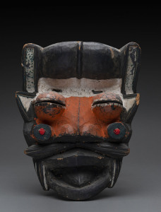 Poro mask, carved wood and cloth with orange and white polychrome finish, Dan-Guere tribe, Ivory Coast, ​36cm high