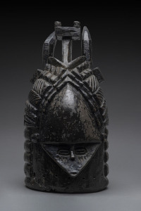 Bundu mask, double sided with two horns, carved wood with remains of painted black finish, Mendi tribe, Sierra Leone, 44cm high