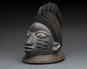 Edan mask, carved wood with remains of blue polychrome finish with white eyes, Yoruba tribe, Nigeria, 33cm high
