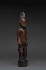 A male standing figure, carved wood with remains of red finish, Senufo tribe, Ivory Coast, ​38cm high