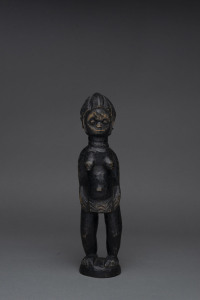 A standing female figure, carved wood with black finish, Mendi tribe, Sierra Leone, 32cm high