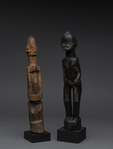 Two standing figures, carved wood with black painted finishes, Dogon and Malinke tribes, Mali, 28cm and 29cm high