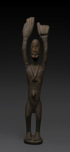 Tellem figure with upraised arms, carved wood with remains of painted finish, Dogon tribe, Mali, 45cm high