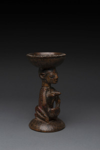 Kneeling female figure with divination bowl, carved wood with remains of polychrome finish, Yoruba tribe, Nigeria, 20cm high