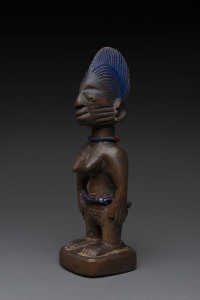 Ibegi female standing nude figure, carved wood and trade beads with blue painted hair, Yoruba tribe, Nigeria, 25cm high