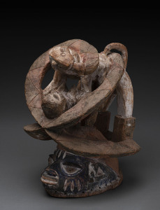 Gelede society mask, ornately carved wood with polychrome finish in the form of an entwined leopard and female figure, Yoruba tribe, Nigeria, 49cm high
