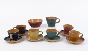 An Australian pottery demi-tasse set for six people, mid 20th century, (14 items), incised monogram "D.K.", the saucers 11cm diameter