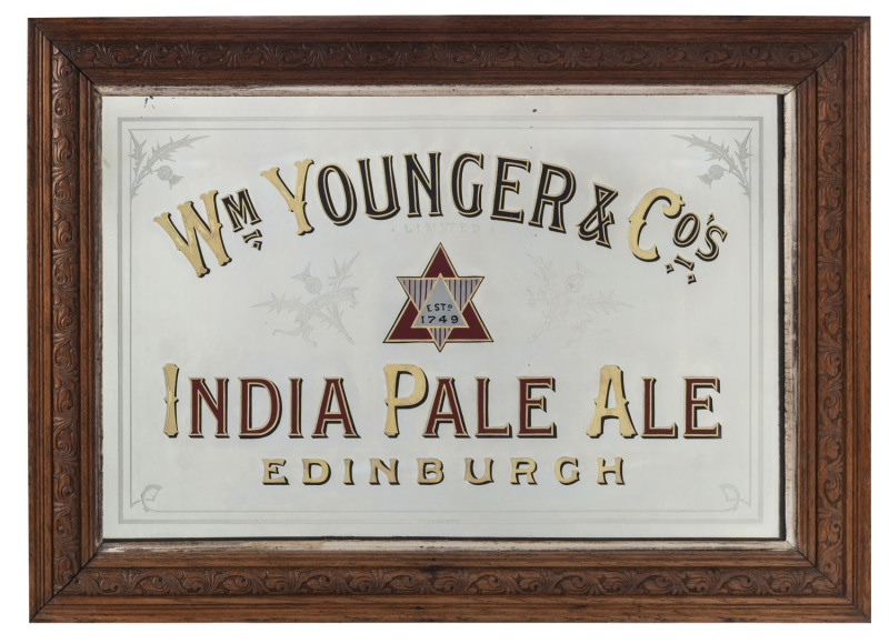 A VINTAGE ETCHED GLASS PUB MIRROR, for "Wm YOUNGER & Co's., INDIA PALE ALE", painted with the dated trademark and with etched trademarked thistles, by Thomas J. Ford of Edinburgh, with their label verso on the original oak frame, overall 64 x 89cm.