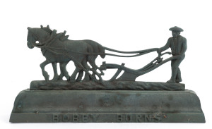 "BOBBY BURNS" cast brass ornament, early 20th century, 14cm high, 29cm wide