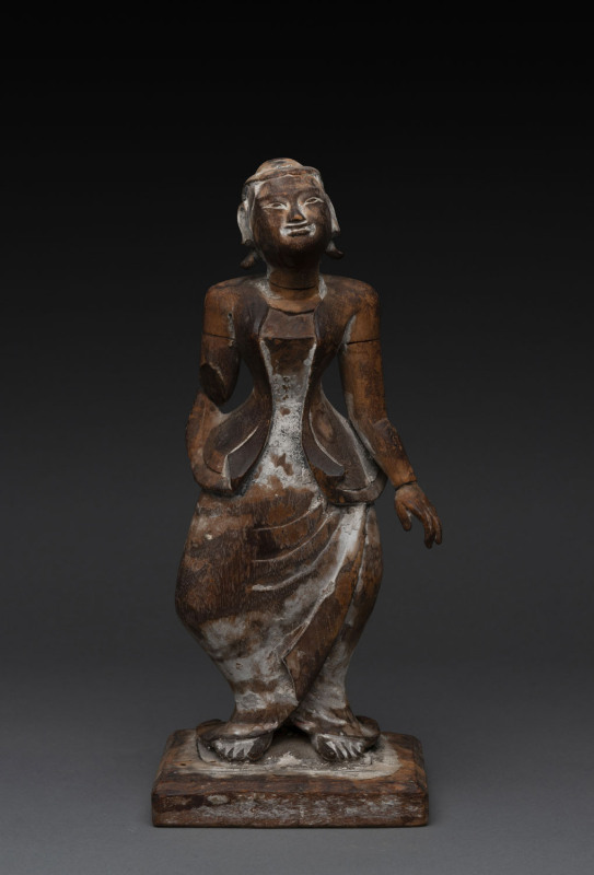 A Burmese statue of a standing woman, carved wood with polychrome finish, 19th century, ​31cm high