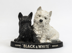 "BLACK & WHITE SCOTCH WHISKY" point of sale advertising display, painted rubber, early to mid 20th century, 21cm high, 27cm wide