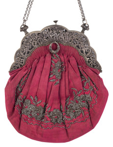A silver mounted bead work purse, 19th century, 24cm high, 20cm wide