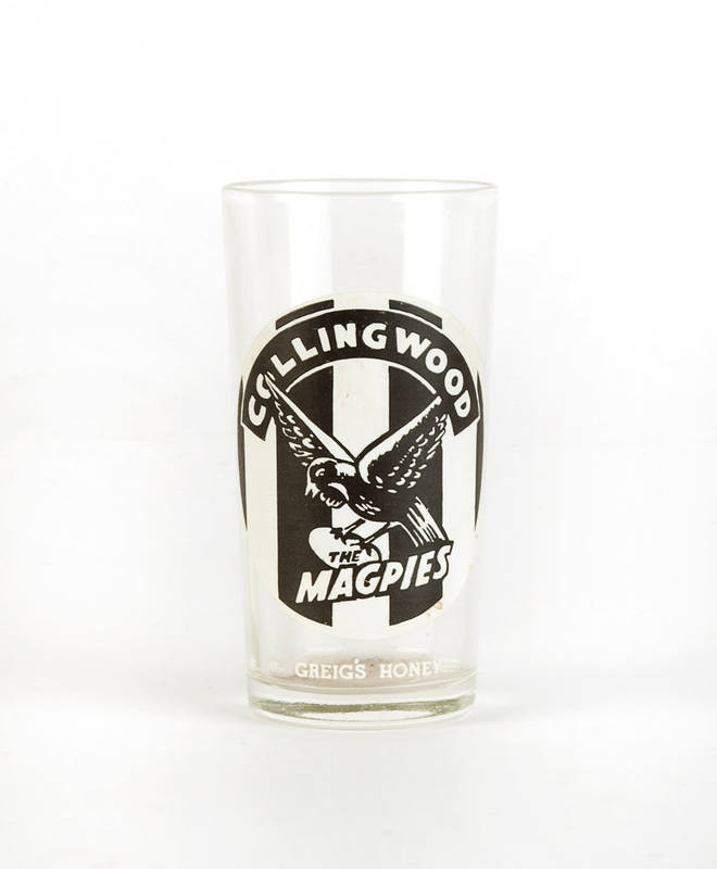 c1957 Greig's Honey Football glass for Collingwood. Fine condition (with "Greig's Honey" at base).