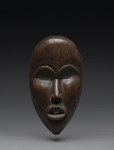 A ceremonial mask, carved wood, Dan tribe, Ivory Coast, 23cm high
