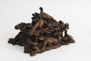 A Black Forest jewellery box, ornately carved wood with fox and pheasants, 19th century, 21cm high, 33cm wide, 23cm deep