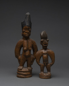 Two Ibegi figures, carved wood with remains of painted finish, Yoruba tribe, Nigeria, ​33.5cm and 25cm high