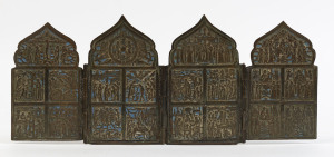 A Russian four-panelled icon which depicts the Feasts of the Church, cast brass and remains of blue enamel, 19th century,15cm high, 35cm wide