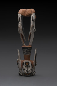 A food hook, carved wood and shells with earth pigment decoration, Papua New Guinea, 61cm high