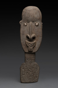 A spirit figure, carved wood with shell eyes, Papua New Guinea, 50cm high