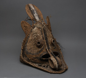 Didagur mask, woven cane, clay, feather and earth pigment, Papua New Guinea, 67cm high