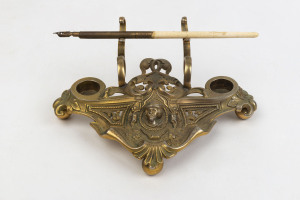 A French desk set, cast and gilt metal with pen, 19th century, 19cm wide