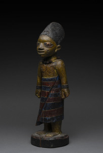 A standing figure with bead necklace, carved wood with polychrome finish, Yoruba tribe, Nigeria, 51cm high