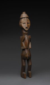 A standing male figure, carved wood with patinated finish, Ijo tribe, Nigeria, 55cm high