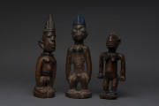 Three Ibegi statues, carved wood, beads and metal with remains of polychrome finish, Yoruba tribe, Nigeria, ​28cm, 27cm and 22cm high