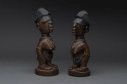 Two female Ibegi statues, carved wood, beads and fibre with remains of painted finish, Senufo tribe Ivory Coast, ​24cm high