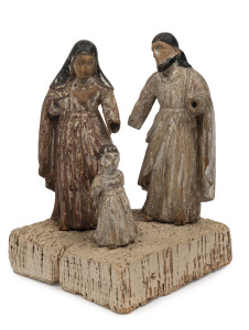 An antique figural group depicting Mary, Joseph and young Jesus, carved wood with polychrome finish, 18th/19th century,26.5cm high overall