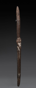 A figural staff, carved wood with earth pigments, Papua New Guinea, 87cm high