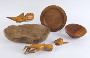 Three wooden bowls, kangaroo ornament, a shoe last and a hand sculpture, 20th century, (6 items), the largest bowl 45cm wide