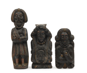 A priest (with arm in sling), a bride and a bridegroom, circa 1650s, antique figural carved oak pieces with remnant polychrome finish, 29cm, 22cm and 19cm high. Removed from a 17th century wedding chest created for a wealthy Catholic bride and groom. The priest has his arm in a sling representing the Catholic Church being persecuted by the Protestant Puritans led by Cromwell. The figures (and the chest, which never arrived) were purchased by the Greenbergs in an antique shop in Glastonbury, lat