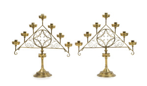 A pair of antique Gothic seven branch brass candelabra, 19th century, 53cm high, 51cm wide