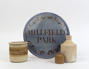 "MILLFIELD PARK" English pottery plaque, pottery jar and two pottery bottles, 19th and 20th century, the plaque 27cm diameter