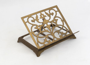 An antique brass Bible stand, 19th century, ​20cm high, 28cm wide, 27cm deep