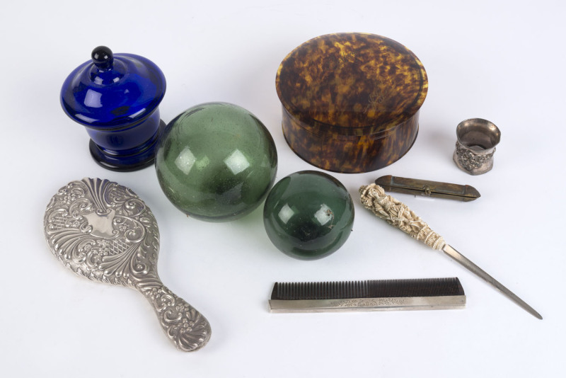 Collar box, letter opener, hand mirror, comb, cigar case, glass buoys and Bristol glass jar, 19th and 20th century, (9 items), ​the mirror 26cm high