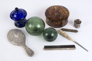 Collar box, letter opener, hand mirror, comb, cigar case, glass buoys and Bristol glass jar, 19th and 20th century, (9 items), the mirror 26cm high