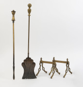 A pair of antique brass firedogs and fire tools, 19th century, (4 items), the firedogs 17cm high, 15cm wide, 16cm deep.