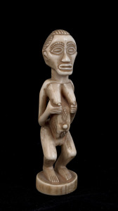 Female fetish figure, carved ivory, Baluba tribe, Southern Congo, 15.5cm high
