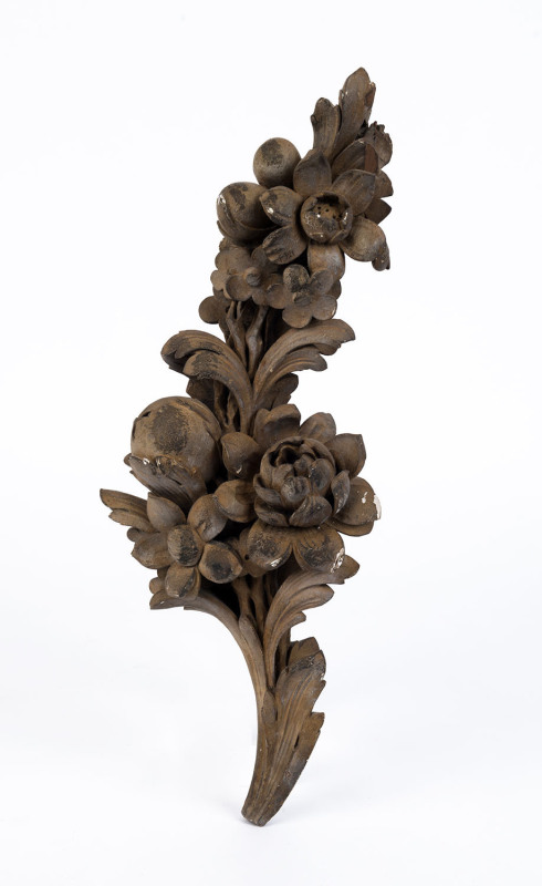 An antique floral wood carving with remains of gilt finish, 19th century, ​48cm high