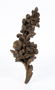 An antique floral wood carving with remains of gilt finish, 19th century, 48cm high