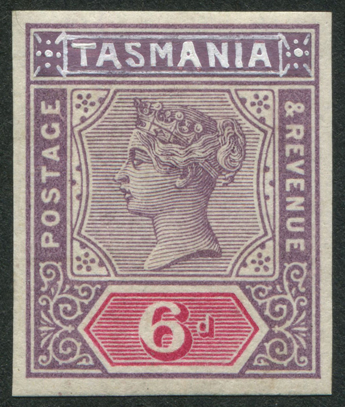 TASMANIA : ESSAYS: 1892-99 Tablets De La Rue imperforate 6d 'IMPERIUM' essay in carmine & violet with 'TASMANIA' and corner ornaments hand-painted in China white, with informatively write-up. Superb.