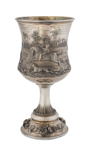 WILLIAM EDWARDS "Victorian Rifle Club Challenge Cup, Match No.1, First Prize" sterling silver trophy cup, circa 1863 superbly adorned with fine and deep repousse decoration by master decorator William Edwards depicting a hunting scene with three kangaroos an emu and hunters on horseback. Cup blank made by Daniel and Charles Houle, London, 1861. Original BRUSH & MacDONNELL plush box (rare)