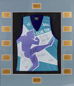 INAUGURAL CLUB TEN MEMBERS 1995, display comprising Club 10 jumper, signed by inaugural Club 10 Members - Gary Ablett, Wayne Carey, Jason Dunstall, Stewart Loewe, Glen Jakovich, Greg Williams, Tony Lockett, Garry Lyon, Gavin Brown & Gavin Wanganeen, windo