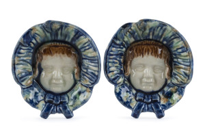 Two Australian pottery face plaque dishes titled on the reverse "WIN" and "DEAN" and dated 27/6/20. 10.5 x 9.5cm