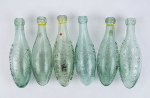 Six assorted torpedo bottles by "THO'S TROOD & SONS MELBOURNE", "L.C. GUNSSER, MINERAL SPRINGS, BALLARAT", "P.G. DIXON & Co. ROSSLYN St. MELBOURNE", and three "ROWLANDS LATE ROWLANDS AND LEWIS BALLARAT & MELBOURNE", 24cm high