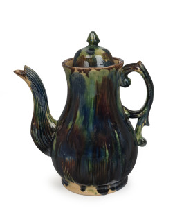BENDIGO POTTERY Colonial coffee pot and cover with bold mottled green, blue and brown glaze, circa 1880, extremely rare.A less striking and the only other known example is housed by the National Gallery of Australia (purchased in 1988).26cm high