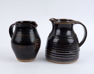 LES BLAKEBOROUGH: Two pottery jugs, both stamped "L.B." one with Sturt Pottery mark, ​17cm and 16cm high